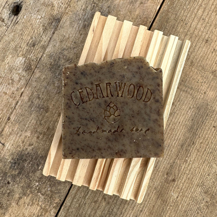 Coffee handmade soap bar on wood soap dish