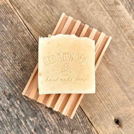 Dog shampoo handmade soap bar on wood soap dish