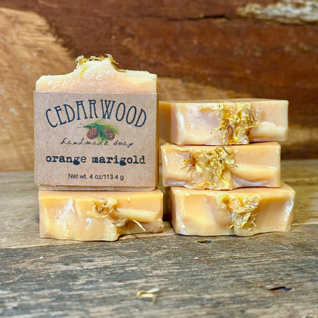 Five bars of handmade orange marigold handmade soap