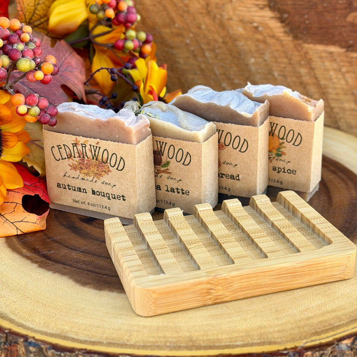 Four handmade fall soaps and bamboo soap with with fall decor