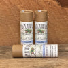 Three Kraft paper tubes of lavender-scented deodorant