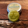 Hemp seed oil smiley face lotion bar in aluminum tin