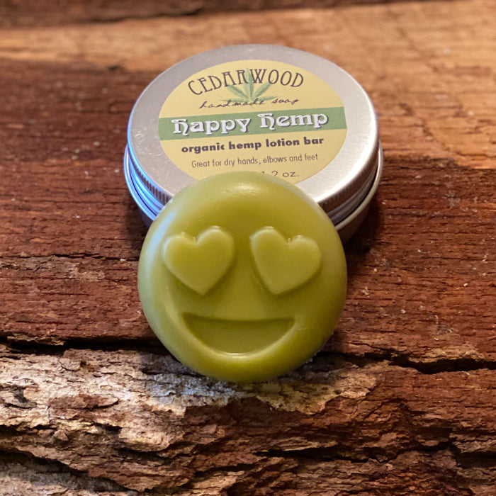 Hemp seed oil smiley face lotion bar in aluminum tin