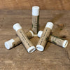 Five tubes of Lime coconut lip balm