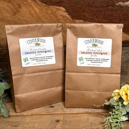 Two kraft paper bags of all-natural laundry powder