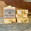 Five bars of handmade orange marigold soap