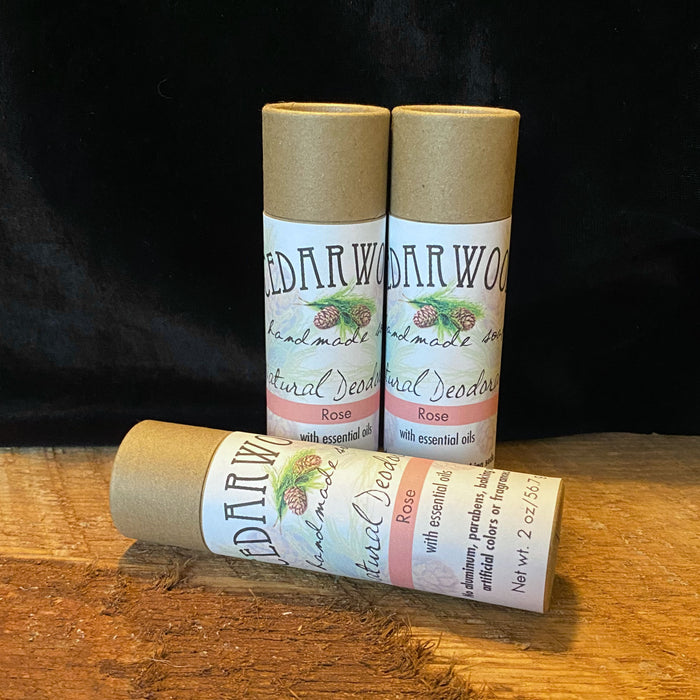 Three kraft paper tubes of Rose-scented deodorant