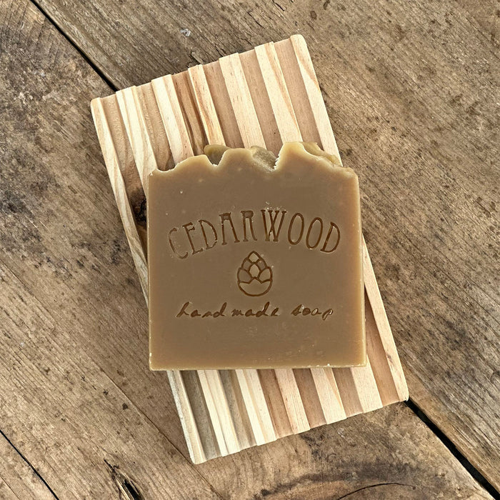 Handmade shampoo beer soap on wood soap dish